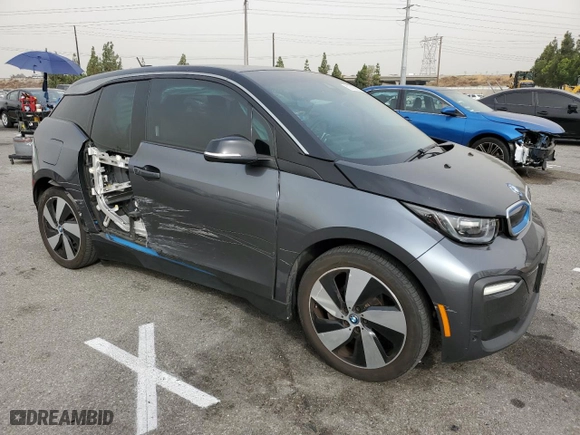 2018 BMW i3 with VIN WBY7Z2C55JVE64933, listed as a Copart auction lot 62085683 with 47,998 mi miles. Bid and sale history available at carsss.com. Image 4.