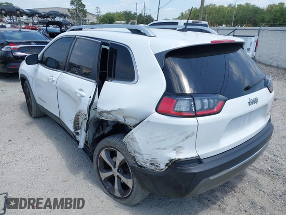 2019 Jeep Cherokee Limited with VIN 1C4PJLDB8KD402904, listed as a IAAI auction lot 42107306 with 96,677 mi miles and . Bid and sale history available at DreamBid. Image 3.