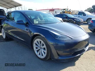 2022 Tesla Model 3 with VIN 5YJ3E1EA1NF372879, listed as a IAAI auction lot 41993437 with 60,926 mi miles. Bid and sale history available at carsss.com. Image 1.
