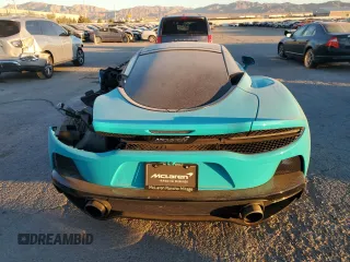 2023 McLaren GT z VIN SBM22GCA0PW002765, wystawiony jako Copart lot #78866364 z przebiegiem Nie podano mil oraz Szkody całkowita. Historia ofert i sprzedaży dostępna na DreamBid. Obrazek 6.