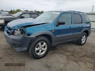 2005 Mazda Tribute i with VIN 4F2YZ02ZX5KM17738, listed as a Copart auction lot 72346384 with 203,245 mi miles and Salvage Title. Bid and sale history available at carsss.com. Image 1.