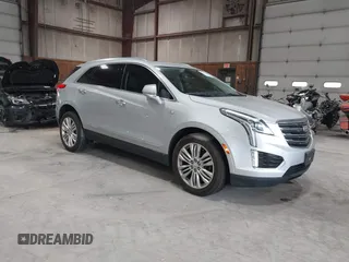 2018 Cadillac XT5 Premium Luxury AWD with VIN 1GYKNFRS7JZ223709, listed as a IAAI auction lot 42471384 with 57,535 mi miles and . Bid and sale history available at DreamBid. Image 1.