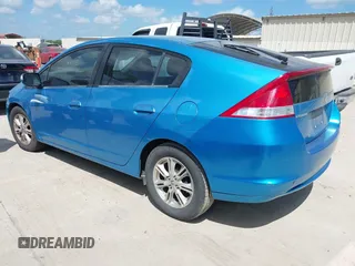 2010 Honda Insight EX with VIN JHMZE2H71AS003290, listed as a IAAI auction lot 42601332 with 163,510 mi miles and . Bid and sale history available at DreamBid. Image 3.