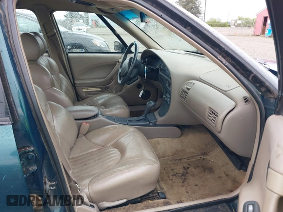 1998 Pontiac Bonneville SE with VIN 1G2HX52K0W4211117, listed as a IAAI auction lot 42125471 with 187,249 mi miles. Bid and sale history available at carsss.com. Image 5.