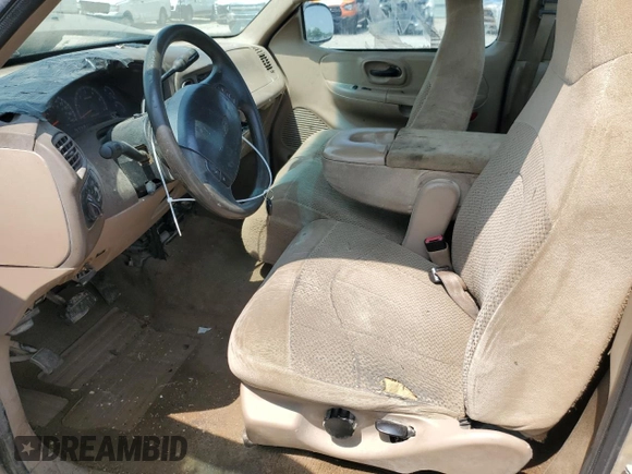 1999 Ford F-150 with VIN 1FTRF17W8XKA37849, listed as a Copart auction lot 58383265 with Not provided miles and Salvage title. Bid and sale history available at DreamBid. Image 7.