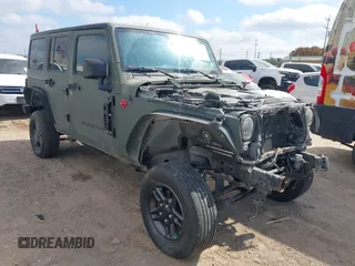 2015 Jeep Wrangler Unlimited Rubicon with VIN 1C4BJWFG0FL700153, listed as a IAAI auction lot 42227425 with 110,655 mi miles and . Bid and sale history available at DreamBid. Image 1.