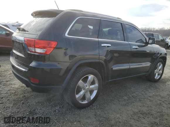 2013 Jeep Grand Cherokee Overland with VIN 1C4RJECT6DC655355, listed as a Copart auction lot 85654554 with 135,343 mi miles and Salvage Title. Bid and sale history available at carsss.com. Image 3.