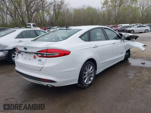 2017 Ford Fusion Hybrid SE with VIN 3FA6P0LU1HR301107, listed as a IAAI auction lot 41932701 with 177,983 mi miles and . Bid and sale history available at DreamBid. Image 4.