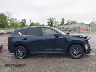 2017 Mazda CX-5 Touring z VIN JM3KFBCL4H0156571, wystawiony jako IAAI lot #42183562 z przebiegiem 135 595 mil mil oraz . Historia ofert i sprzedaży dostępna na DreamBid. Obrazek 14.