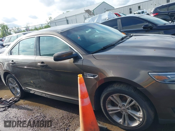 2015 Ford Taurus SEL with VIN 1FAHP2E87FG194170, listed as a IAAI auction lot 42184749 with 222,609 mi miles and . Bid and sale history available at carsss.com. Image 13.