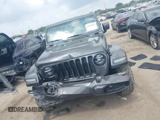 2021 Jeep Gladiator Overland with VIN 1C6HJTFG4ML617175, listed as a IAAI auction lot 42148031 with 70,627 mi miles and . Bid and sale history available at DreamBid. Image 12.