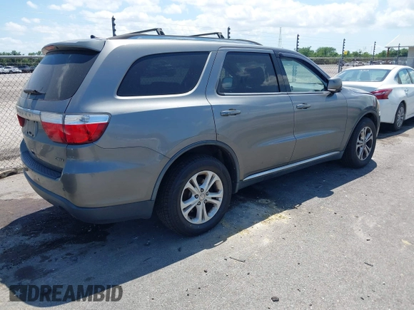 2011 Dodge Durango Crew with VIN 1D4SE4GT5BC639156, listed as a IAAI auction lot 42147490 with 204,285 mi miles and . Bid and sale history available at carsss.com. Image 4.