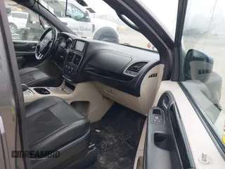 2019 Dodge Grand Caravan SXT with VIN 2C4RDGCGXKR723991, listed as a IAAI auction lot 40670679 with 174,387 mi miles and . Bid and sale history available at DreamBid. Image 5.