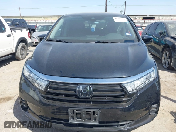2022 Honda Odyssey EX-L z VIN 5FNRL6H77NB032147, wystawiony jako IAAI lot #41795448 z przebiegiem 64 160 mil mil oraz . Historia ofert i sprzedaży dostępna na DreamBid. Obrazek 12.
