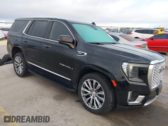 2021 GMC Yukon Denali with VIN 1GKS2DKL3MR308321, listed as a IAAI auction lot 41771365 with 63,415 mi miles. Bid and sale history available at carsss.com. Image 1.
