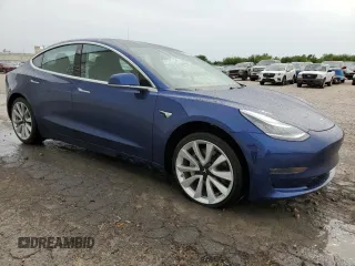 2020 Tesla Model 3 Standard Range Plus with VIN 5YJ3E1EA4LF645858, listed as a Copart auction lot 55291565 with 23,080 mi miles and Clean Title. Bid and sale history available at DreamBid. Image 4.