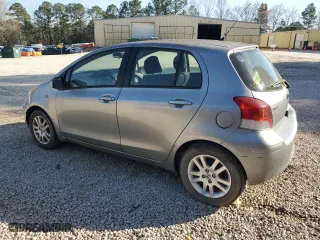 2009 Toyota Yaris with VIN JTDKT903X95240915, listed as a Copart auction lot 49143135 with 188,817 mi miles and Clean Title. Bid and sale history available at carsss.com. Image 2.