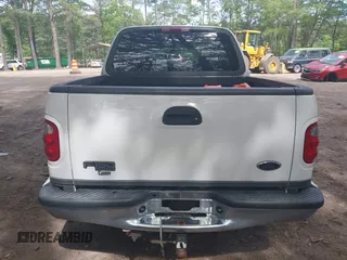 2003 Ford F-150 XLT with VIN 1FTRW07663KD69809, listed as a IAAI auction lot 42198549 with 166,466 mi miles and . Bid and sale history available at DreamBid. Image 16.