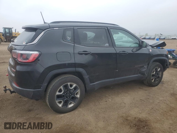 2018 Jeep Compass Trailhawk with VIN 3C4NJDDB6JT207289, listed as a Copart auction lot 56013675 with 83,385 mi miles and Salvage title. Bid and sale history available at DreamBid. Image 3.
