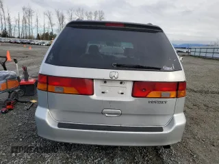 2002 Honda Odyssey EX z VIN 2HKRL18692H578746, wystawiony jako Copart lot #51281845 z przebiegiem 282 844 mil mil oraz Szkoda całkowita • Salvage title. Historia ofert i sprzedaży dostępna na DreamBid. Obrazek 6.
