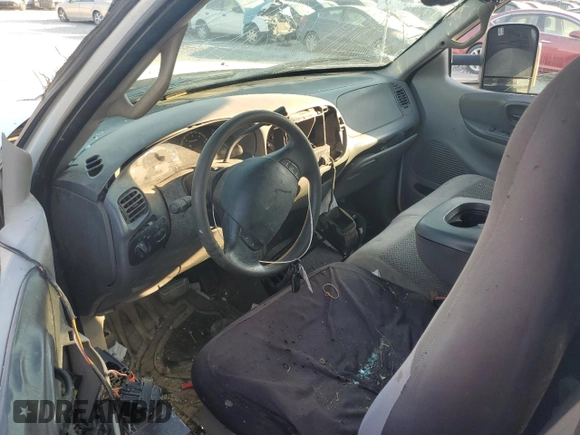 2000 Ford F-150 XL with VIN 1FTZX172XYNB23013, listed as a Copart auction lot 87393774 with 0 mi miles and Salvage Title. Bid and sale history available at carsss.com. Image 8.