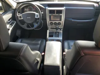 2009 Jeep Liberty Limited with VIN 1J8GN58K79W552651, listed as a Copart auction lot 77890874 with 140,342 mi miles and Salvage Title. Bid and sale history available at carsss.com. Image 8.