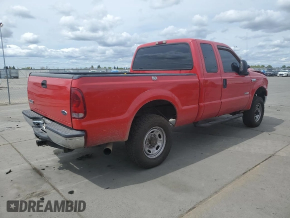 2005 Ford F-250 XL with VIN 1FTSX21P15EA76932, listed as a Copart auction lot 52053355 with 134,955 mi miles and Salvage title. Bid and sale history available at DreamBid. Image 3.