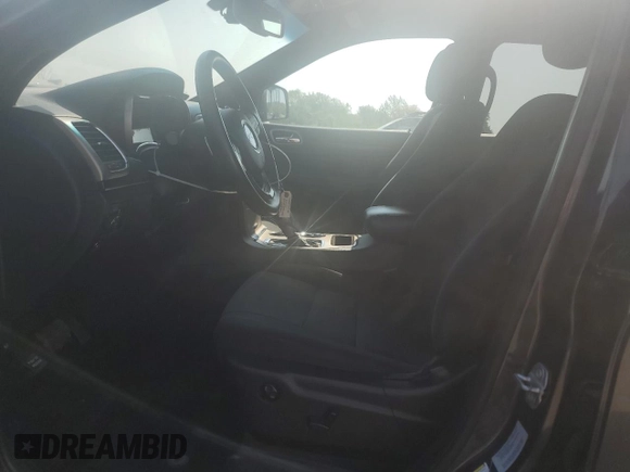 2016 Jeep Grand Cherokee Laredo with VIN 1C4RJFAG3GC343462, listed as a Copart auction lot 56986475 with 100,240 mi miles and Salvage title. Bid and sale history available at DreamBid. Image 7.