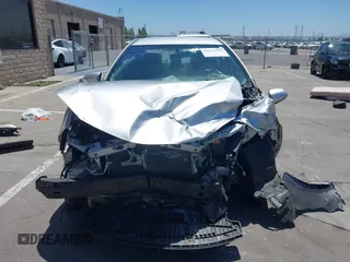 2016 Toyota Corolla L z VIN 5YFBURHE4GP410981, wystawiony jako IAAI lot #42293582 z przebiegiem 77 319 mil mil oraz . Historia ofert i sprzedaży dostępna na DreamBid. Obrazek 6.