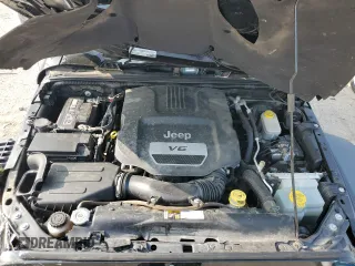 2015 Jeep Wrangler Rubicon Hard Rock z VIN 1C4BJWCG9FL714606, wystawiony jako Copart lot #68521014 z przebiegiem 35 187 mil mil oraz Szkoda całkowita • Salvage title. Historia ofert i sprzedaży dostępna na DreamBid. Obrazek 14.
