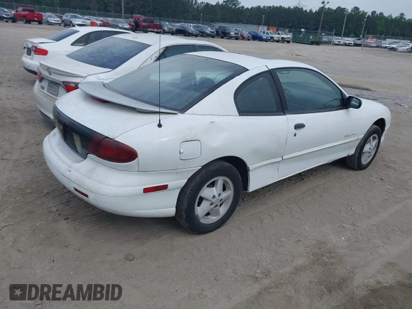 1999 Pontiac Sunfire SE z VIN 1G2JB1247X7582141, wystawiony jako IAAI lot #42198418 z przebiegiem Nie podano mil oraz . Historia ofert i sprzedaży dostępna na DreamBid. Obrazek 4.