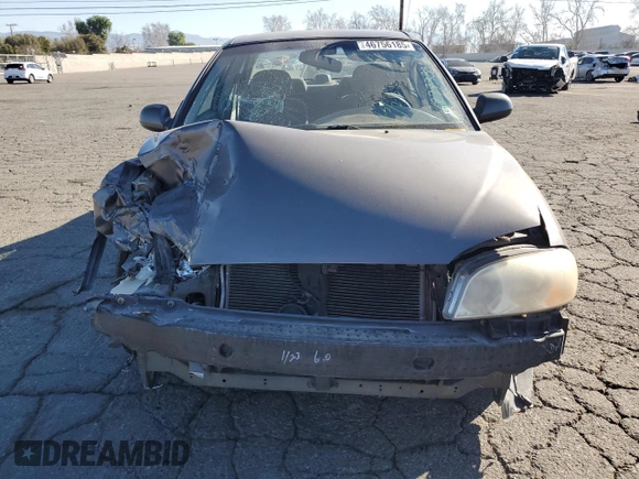 2003 Kia Spectra z VIN KNAFB121335277388, wystawiony jako Copart lot #46756185 z przebiegiem 151 235 mil mil oraz Szkoda całkowita • Salvage title. Historia ofert i sprzedaży dostępna na DreamBid. Obrazek 5.