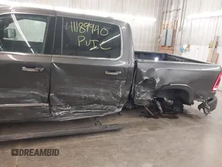 2020 Ram 1500 Limited with VIN 1C6SRFHT8LN254585, listed as a IAAI auction lot 41189940 with 58,631 mi miles. Bid and sale history available at carsss.com. Image 6.