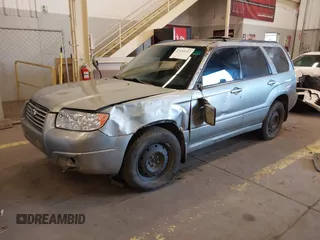 2007 Subaru Forester X w/Premium Pkg with VIN JF1SG65657H719525, listed as a IAAI auction lot 41696437 with 217,895 mi miles. Bid and sale history available at carsss.com. Image 2.
