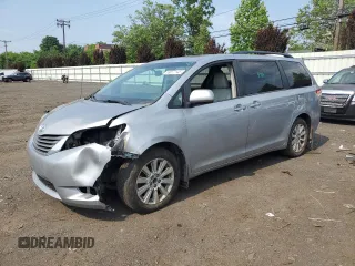 2014 Toyota Sienna Limited z VIN 5TDDK3DC9ES072708, wystawiony jako Copart lot #59977145 z przebiegiem 174 603 mil mil oraz Szkoda całkowita • Salvage title. Historia ofert i sprzedaży dostępna na DreamBid. Obrazek 1.