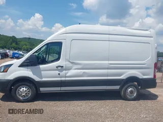 2023 Ford Transit Cargo with VIN 1FTBR2X81PKB38408, listed as a IAAI auction lot 42608271 with 28,384 mi miles and . Bid and sale history available at DreamBid. Image 14.