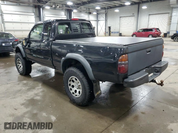 2004 Toyota Tacoma with VIN 5TEWN72N14Z424211, listed as a Copart auction lot 51815615 with 203,415 mi miles and Salvage Title. Bid and sale history available at DreamBid. Image 2.