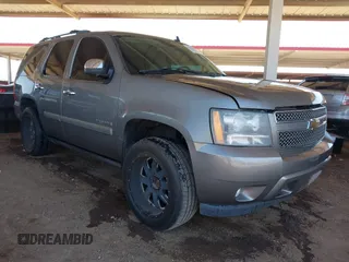 2007 Chevrolet Tahoe LTZ z VIN 1GNFK13037J331012, wystawiony jako IAAI lot #42122457 z przebiegiem 111 130 mil mil oraz . Historia ofert i sprzedaży dostępna na DreamBid. Obrazek 1.