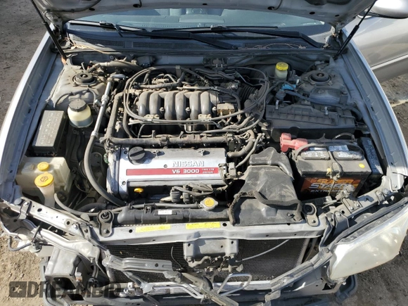 2000 Nissan Maxima GXE z VIN JN1CA31D2YT726856, wystawiony jako Copart lot #45950615 z przebiegiem 101 919 mil mil oraz Szkoda całkowita • Salvage title. Historia ofert i sprzedaży dostępna na DreamBid. Obrazek 11.