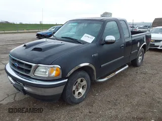 1997 Ford F-150 with VIN 2FTDX1720VCA73590, listed as a IAAI auction lot 41956713 with 128,220 mi miles and . Bid and sale history available at DreamBid. Image 2.