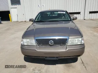 2005 Mercury Grand Marquis LS Premium z VIN 2MEFM75W95X642339, wystawiony jako Copart lot #50391035 z przebiegiem 127 526 mil mil oraz Szkoda całkowita • Salvage title. Historia ofert i sprzedaży dostępna na DreamBid. Obrazek 5.