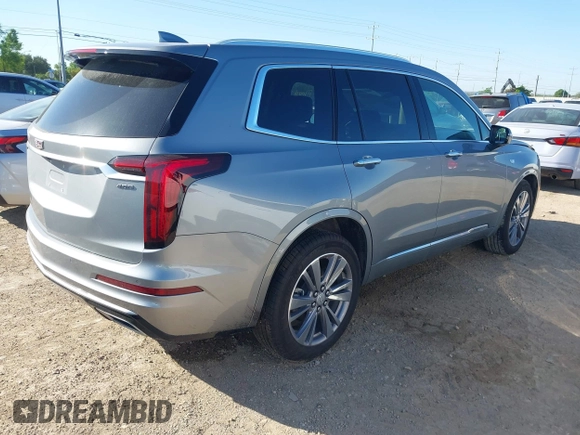 2025 Cadillac XT6 FWD Premium Luxury with VIN 1GYKPCRS3SZ118384, listed as a IAAI auction lot 41962391 with 6,946 mi miles. Bid and sale history available at carsss.com. Image 4.