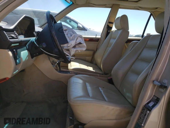 1991 Mercedes-Benz 300 with VIN WDBEA30D1MB497396, listed as a Copart auction lot 55834195 with 179,323 mi miles and Salvage Title. Bid and sale history available at carsss.com. Image 7.