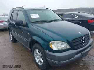 1999 Mercedes-Benz M-Class with VIN 4JGAB54E0XA144942, listed as a IAAI auction lot 41739140 with 1 mi miles. Bid and sale history available at carsss.com. Image 1.