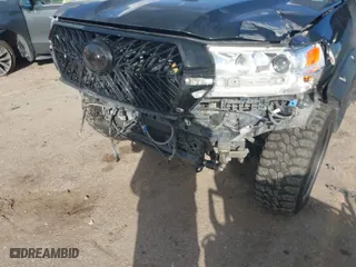 2016 Toyota Land Cruiser with VIN JTMCY7AJ8G4044577, listed as a IAAI auction lot 41482125 with 140,971 mi miles. Bid and sale history available at carsss.com. Image 6.