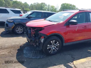 2016 Toyota RAV4 LE with VIN JTMZFREV1GJ098247, listed as a IAAI auction lot 42065800 with 199,172 mi miles and . Bid and sale history available at DreamBid. Image 17.