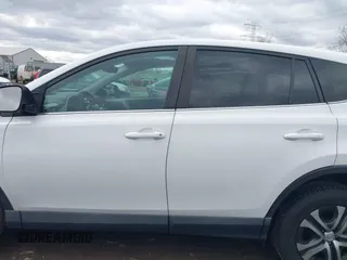 2018 Toyota RAV4 LE with VIN 2T3BFREVXJW793174, listed as a IAAI auction lot 42037936 with 82,304 mi miles. Bid and sale history available at carsss.com. Image 14.