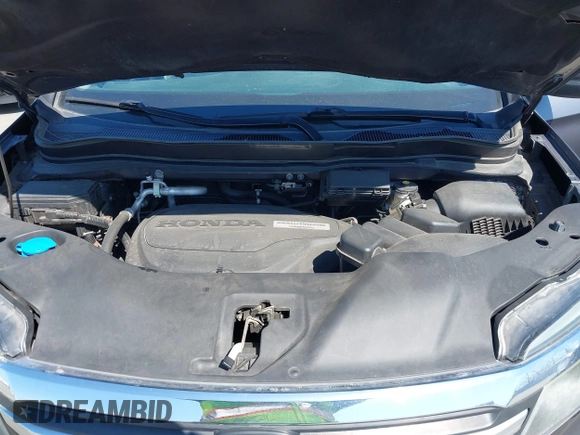 2016 Honda Pilot LX with VIN 5FNYF5H1XGB032851, listed as a IAAI auction lot 41998989 with 68,882 mi miles and . Bid and sale history available at DreamBid. Image 10.
