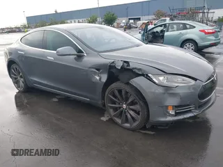 2013 Tesla Model S with VIN 5YJSA1CG5DFP06411, listed as a IAAI auction lot 41079914 with 266,968 mi miles. Bid and sale history available at carsss.com. Image 1.