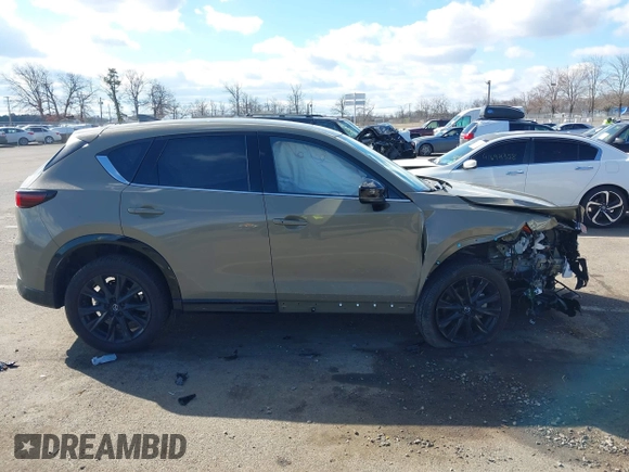 2024 Mazda CX-5 Carbon Edition with VIN JM3KFBAYXR0371954, listed as a IAAI auction lot 41688598 with 13,230 mi miles and . Bid and sale history available at DreamBid. Image 13.